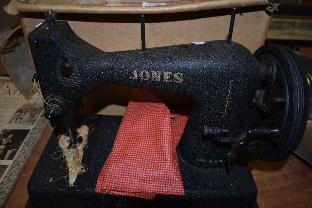 A vintage belt of crank handled sewing machine by Jones the Popular design