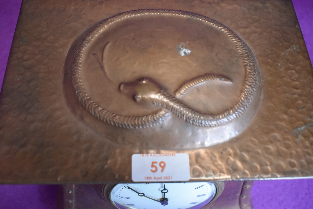 An arts and crafts hammered copper and brass mantel clock having embossed snake to top, another - Image 3 of 4