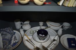 An assortment of table ware and flat ware.