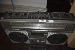 A vintage cassette recorder player boom box by Sanyo