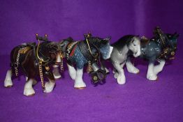 Four ceramic studies of Shire Horses, small sizes with harnesses to three of them