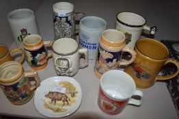 A selection of ceramic German style beer tankards and mugs