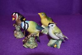 Four Beswick studies, Blue Tit 992B, Greenfinch 2105B, Goldcrest 2415 and Goldfinch (af)