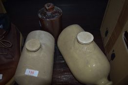 A selection of earthen ware bottles