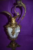 An antique agate and ormolu ewer or wine vessel having cherub handle and foliate work with green man