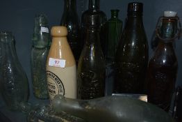 A variety of vintage advertising bottles, some of local interest to Morecambe and Lancaster and