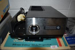 A Hanimex La Ronde semi-auto slide projector.