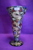 A large Venetian green glass vase having trumpet form and enamelled deer and leaf design.