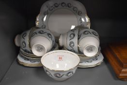 A selection of vintage Windsor bone china including cake plate, cups, saucers and side plates having