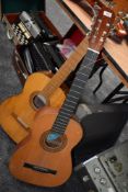 Two vintage Spanish guitars, small sizes, labelled BM Clasico and Hermanos Rodriguez