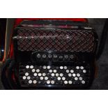 An Ellegaard Special button accordion, with plush lined case, in very clean condition