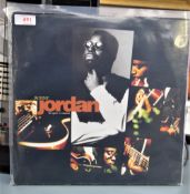 A copy of Ronny Jordan's ' the quiet revolution ' album , acid jazz / soul interest and getting hard