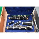 A Bundy (Selmer) resonite clarinet, impressed serial number 1459259, in toughened plastic plush
