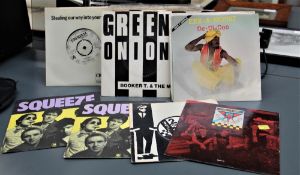 A small lot of seven inch singles with some interesting items on offer here