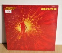 A sealed later press of the Chemical Brothers ' come with us ' unplayed / mint copy