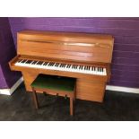 A vintage upright piano, labelled Duck Son & Pinker Ltd and Mahler