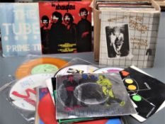 A box of various 45's with some punk / new wave on offer here