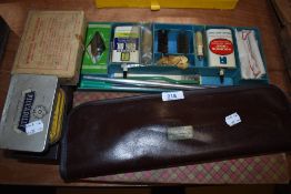 A selection of shotgun airgun or rifle gun cleaning kits