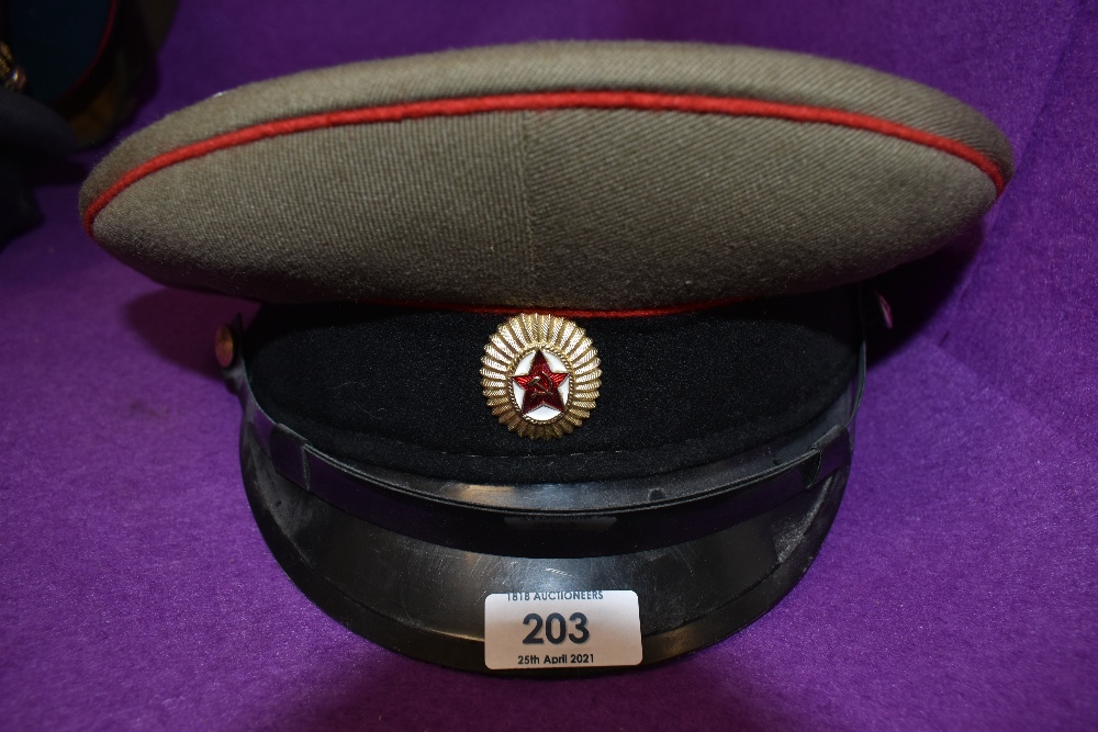 A military officers style cap having Russian cap badge with worn inner label