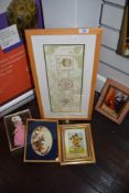 A selection of embroideries,dried flower displays and prints in frames.