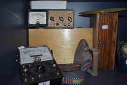 A selection of vintage volt meters and similar,a flat iron and trivet.