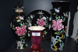 An assortment of three Wood and sons 'Sheraton' items including lidded urn,vase and plate also