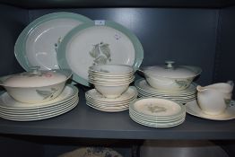 A partial dinner service 'Woodbury' by Wedgwood, platters,bowls, tureens and more amongst this