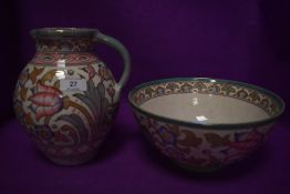 A large Charlotte Rhead for Bursley ware jug and a fruit bowl,both numbered TL76 to underside,