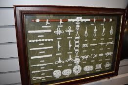 A framed and glazed selection of knot examples.