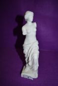 An Alabaster style figurine of classically styled lady, signed G.Ruggeri.