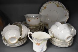 A collection of Crown Chelsea 'Gloria' tea service including cups and saucers,plates and jug.