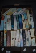 A box of novels, of war time romance interest and modern romance/comedy.