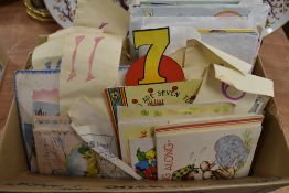 A box full of vintage greetings cards.