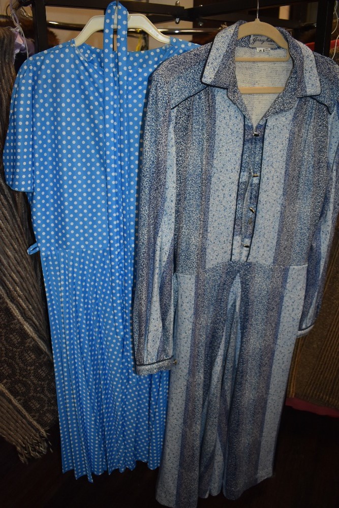 A collection of vintage and retro ladies clothing,mixed styles,eras and sizes.