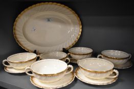 Six soup bowls and saucers and a platter,Royal Staffordshire dinner ware by Clarice Cliff.