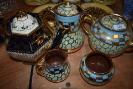 A selection of Sadler tea pots and similar including a jug and sugar bowl.