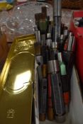 A selection of engineers or gunsmiths measuring or boring tools