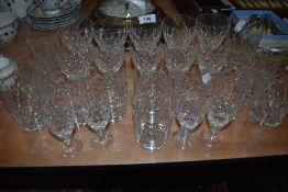 A selection of vintage cut glass, amongst which are tumblers, wine glasses and more.