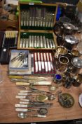 A collection of vintage canteens and flat ware including mother of pearl handled,caddy spoons and