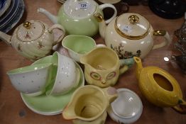 An assortment of vintage ceramics including Keele pottery jugs in the form of birds,Sadler Tea pot