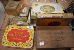 A selection of vintage advertising boxes and smokers humidor containers