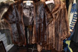 Three vintage fur coats, including mink, a mahogany coloured mink stole,and another similar stole.