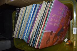 A selection of vinyl albums and records including pop and rock interest