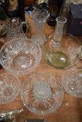 A varied lot of glass ware including cut glass examples, fruit bowls, vases and more.