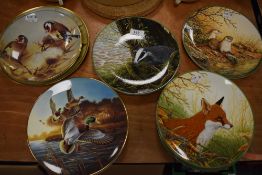 A selection of wildlife related display plates including Coalport, birds, badgers and otters amongst