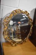 A vintage circular wall mirror having gold foliate frame, mirror approx width (without frame) 45cm