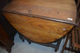 An early to mid 20th Century oak twist gateleg dining table