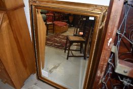 A reproduction gilt frame wall mirror, approx. 110 x 78cm