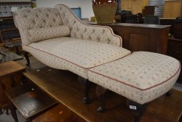 A reproduction Chaise longue and matching footstool