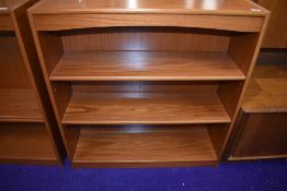A teak effect bookshelf, approx width 90cm